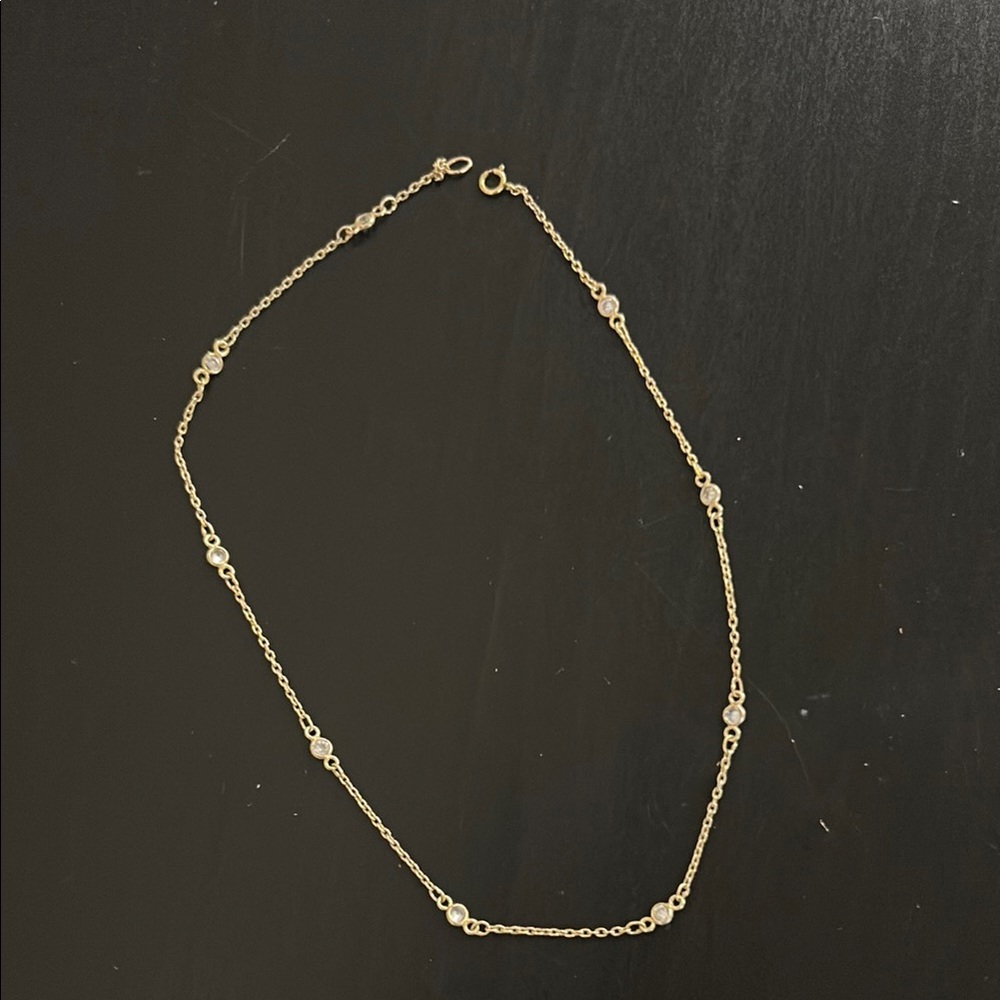 Elegant Gold Necklace with Silver Accents